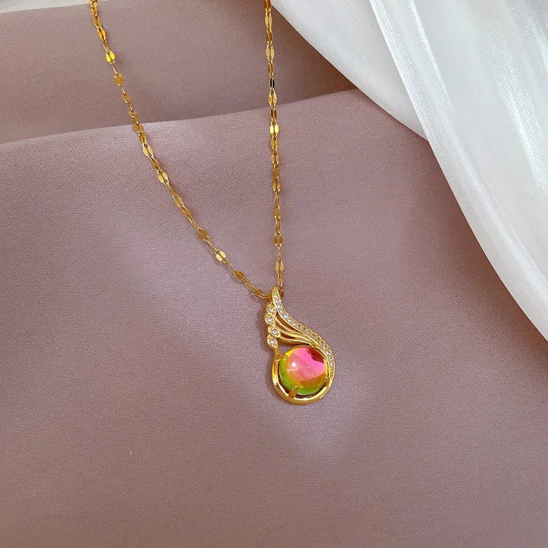 DIEYURO Collier Pendentif Ailes Cercle Coloré Brillant en Zircon pour Femme, Chaîne de Cou Couleur Argent en Acier Inoxydable 316L, Bijou Tendance, Idée Cadeau
